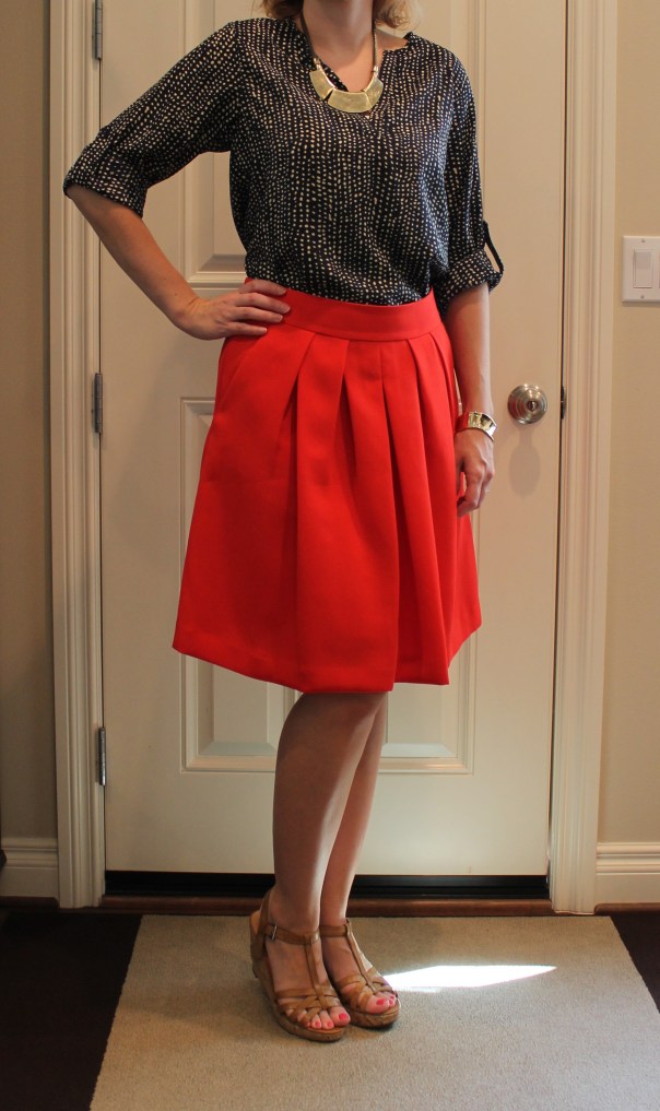 Dotted blouse and red skirt